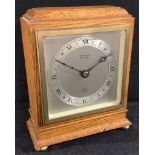 An Elliott clock, stepped square mahogany case, bun feet, 15.5cm