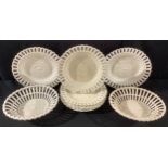 A pair of Wedgwood cream ware open work baskets, 23cm wide, six similar Wedgwood dessert plates (8)