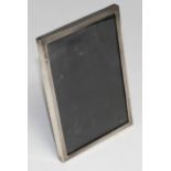 An Art Deco style silver rectangular easel photograph frame, engine turned border, Birmingham 1963