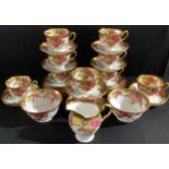A Royal Chelsea Golden Rose pattern tea set