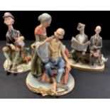 A Capo-di-Monte figure group, elderly gents sat on a wall, 19cm wide; another, vagrant in bowler hat