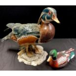 A large model of a mandarin duck, inscribed V. Binoh, 28cm high; a decoy type mallard duck model