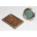 An Edwardian silver circular easel photograph frame, Birmingham 1910; another, rectangular, A & J