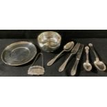 A silver sugar bowl, London1876, 3.4oz; a silver dish, 13.5cm diam, 3.5oz; silver spoons; decanter