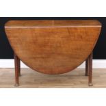 A 'George II' oak gateleg dining table, oval top with fall leaves, cylindrical legs, pad feet,