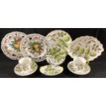 A Royal Worcester part set, reproduction of the Blind Earl pattern, comprising pair of teacups and