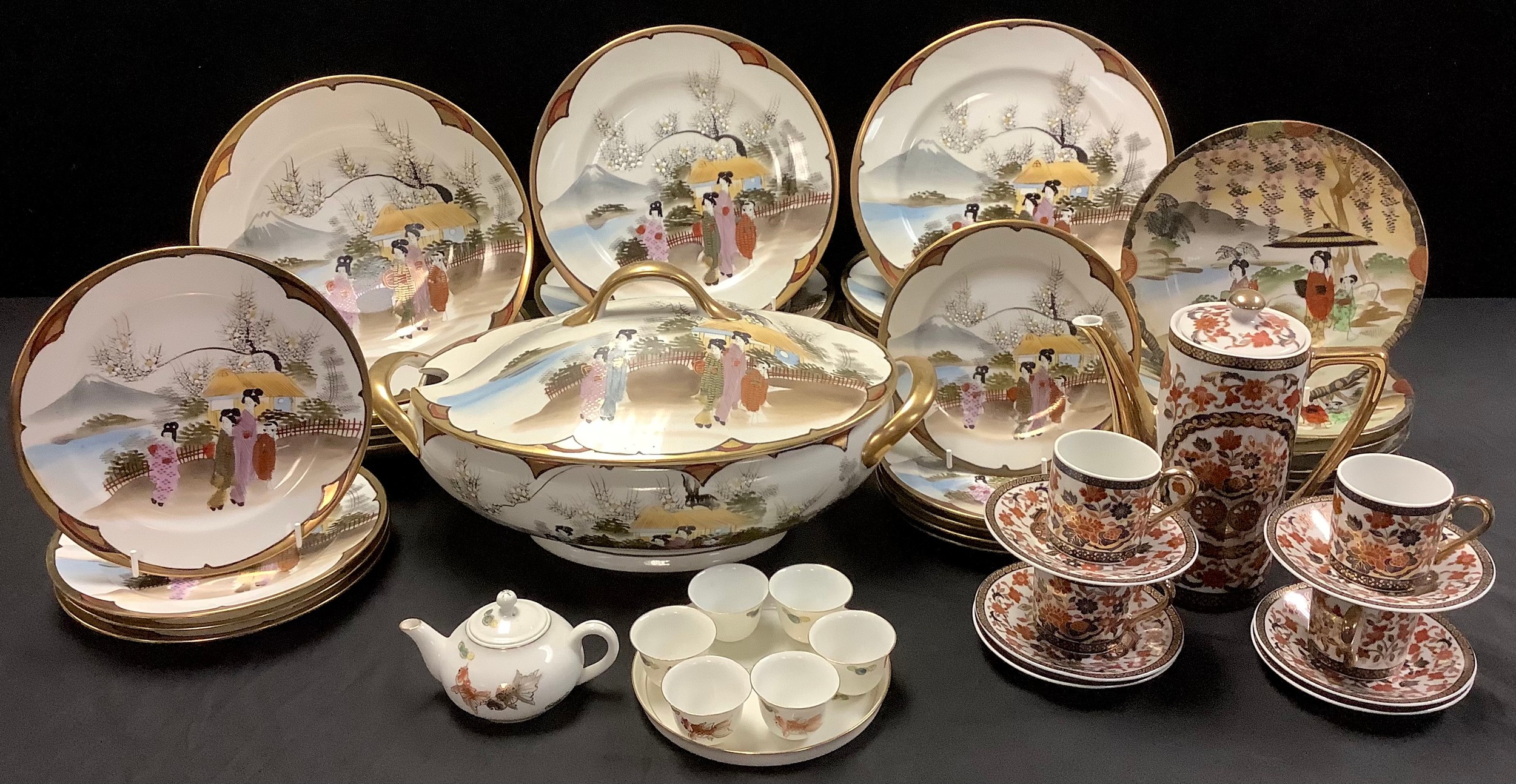 A Japanese export ware diner service; a sake set with teapot and an Imari palette coffee set