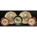 A pair of Staffordshire Phildale cabinet plates, painted by P Worsdale, signed, decorated with a