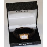 An Accurist lady's 9ct gold and stainless steel watch, boxed