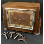 An Art Deco style mahogany Westminster chime mantel clock; four clock keys