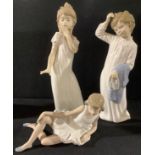 A Nao by Lladro figure, girl holding slippers, 27cm high; others, Sleepy Time, Ballet Girl (3)