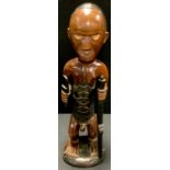 Tribal Art - a carved hardwood figure, 49cm