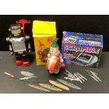 A Japanese Tin plate walking Robot, possibly Horikawa toys; Grandstand Scramble game; Drummer Boy;