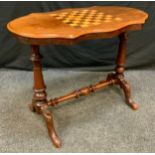 A Victorian Walnut and Walnut veneer games table, shaped top, turned legs and support, 71cm high,