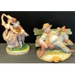 A Capodimonte figure, Dancing Companions, crowned N marks, 25cm high; another Bruno Merli, Tramp