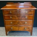 A 20th century walnut chest of drawers, shaped half gallery, rectangular top above four graduated