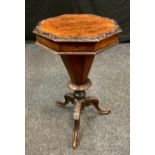 A Victorian hexagonal form tripod sewing machine table, c.1890