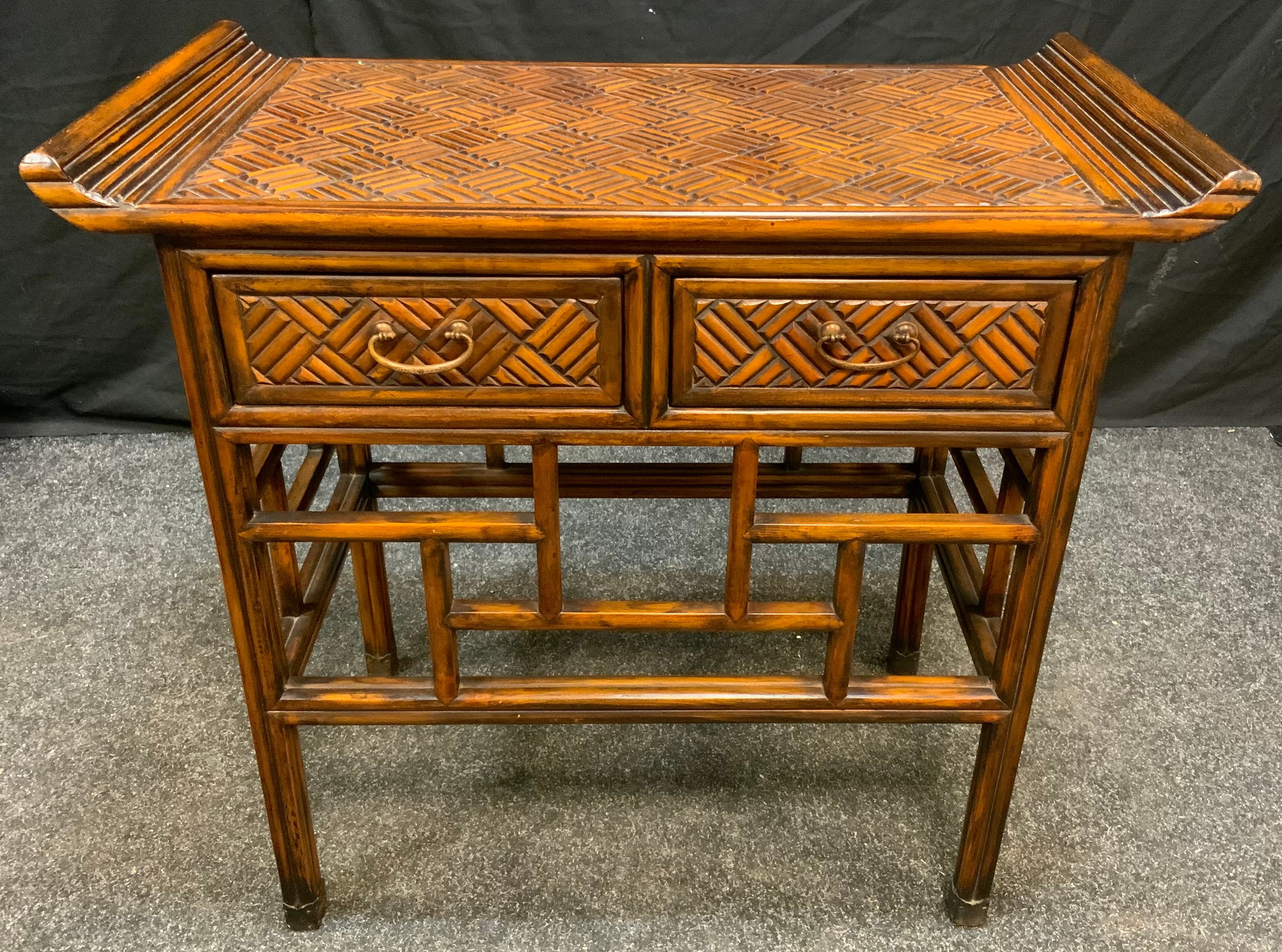 A Reproduction Oriental Style walnut Hall table, carved sleigh-form top above a pair of short - Image 2 of 2