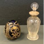 A silver mounted dressing table bottle stopper; a Prussian cobalt blue egg, engraved with double