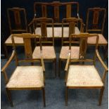 An Edwardian mahogany salon suite, boxwood strung, comprising salon sofa and six chairs, c.1910