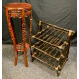 A 20th century Oriental style Mahogany Torchere/pot stand, with chinoiserie carved decoration,