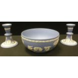 A pair of Wedgwood Jasperware candlesticks; circular fruit bowl (3)