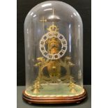 A 20th century Skeleton clock, by J Malcolm Wild, F.B.H.I., silvered chapter ring, black Roman