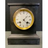 A late Victorian belge noir mantel clock, by Charles Frodsham maker to the Queen, white enamel dial,
