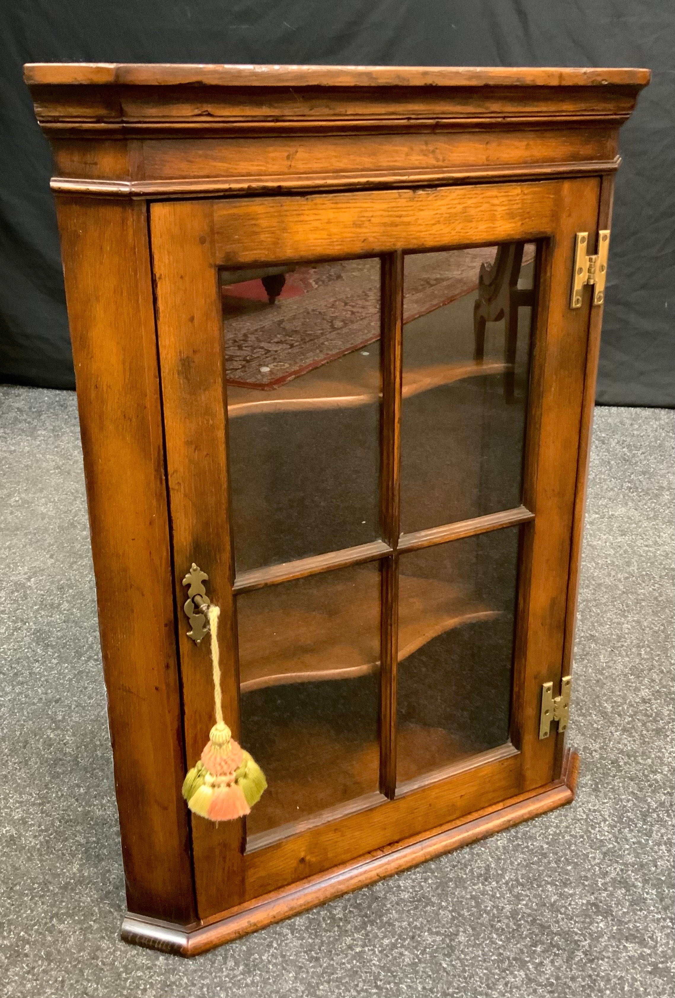 A Reproduction, George III style, Small Oak Corner Cabinet, glazed door enclosing pair of shelves, - Image 2 of 2