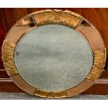 A mid 20th century Atsonea peach and clear glass circular wall mirror, acanthus dividers