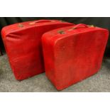 A Revelation, faux crocodile leather suitcase, in red, 73cm x 51cm; and another slightly smaller (2)