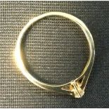 A diamond solitaire ring, modern brilliant cut diamond approx. 0.08ct, 18ct gold shank, 2.3g gross