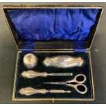 An Edwardian silver five piece manicure set, Jones & Crompton, Birmingham 1911, cased.