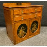 An Early 20th century oak cabinet chest, two long drawers above a pair of cabinet doors with