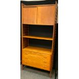 A mid 20th century Laddarax type retro teak wall hanging side unit, with sliding cupboard above open