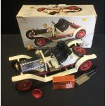 A Mamod Steam Roadster, boxed with tablets
