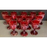 A set of twelve 20th century ruby moulded glass goblet's.(12)