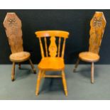 Miniature furniture - a pair of oak spinning chairs, carved backs, 39cm high; another 20th century