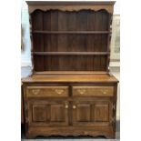 A Griffiths hand crafted bespoke oak dresser, made for Harrods in 1977, 181cm tall x 121.5cm.