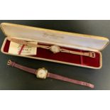A ladies Bentima Star 9ct gold cased wristwatch, silvered dial, Arabic numerals, leather strap,