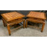 A Pair of 20th Century Chinoiserie style walnut side/occasional tables, carved oversailing tops,