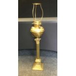 A Victorian Hinks & son brass Corinthian column oil lamp, stepped base, 91cm high