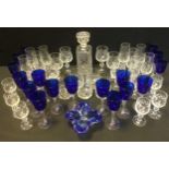 Glassware - a set of eleven blue glass wine glasses; a cut glass decanter, whiskey cups; ect.