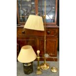 A 20th century adjustable brass floor-standing corner lamp; a chinoiserie table lamp; a brass