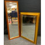 A rectangular mirror, gilt frame, 63cm x 88cm; another, 122cm x 39cm