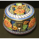 An Art Deco circular lidded bowl, hand painted with chrysanthemums and flowers, printed and