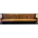 A large 19th century mahogany pew, scroll arms, 323cm long, late 19th century