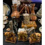A Persian silver plated coffee pot; two copper vessels' a J B Hirsch Co figural candlestick; resin