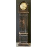A Mid 20th Century Oak longcase clock case of small proportions.