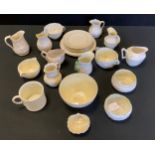 Belleek Irish Porcelain - a 1920s lattice pattern cup; other jugs, sugar bowls, slop bowl, side